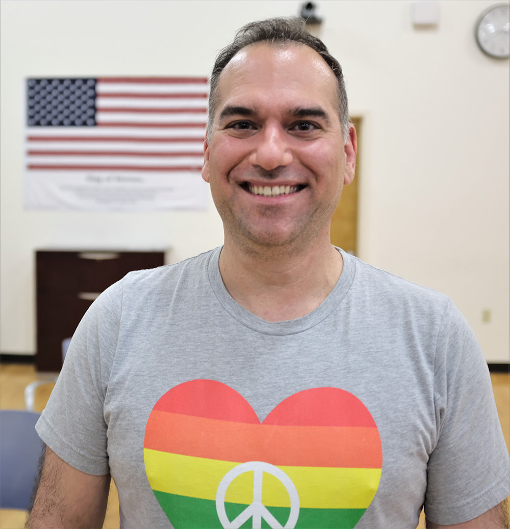Joseph Caserto wears a shirt with his own Pride design.